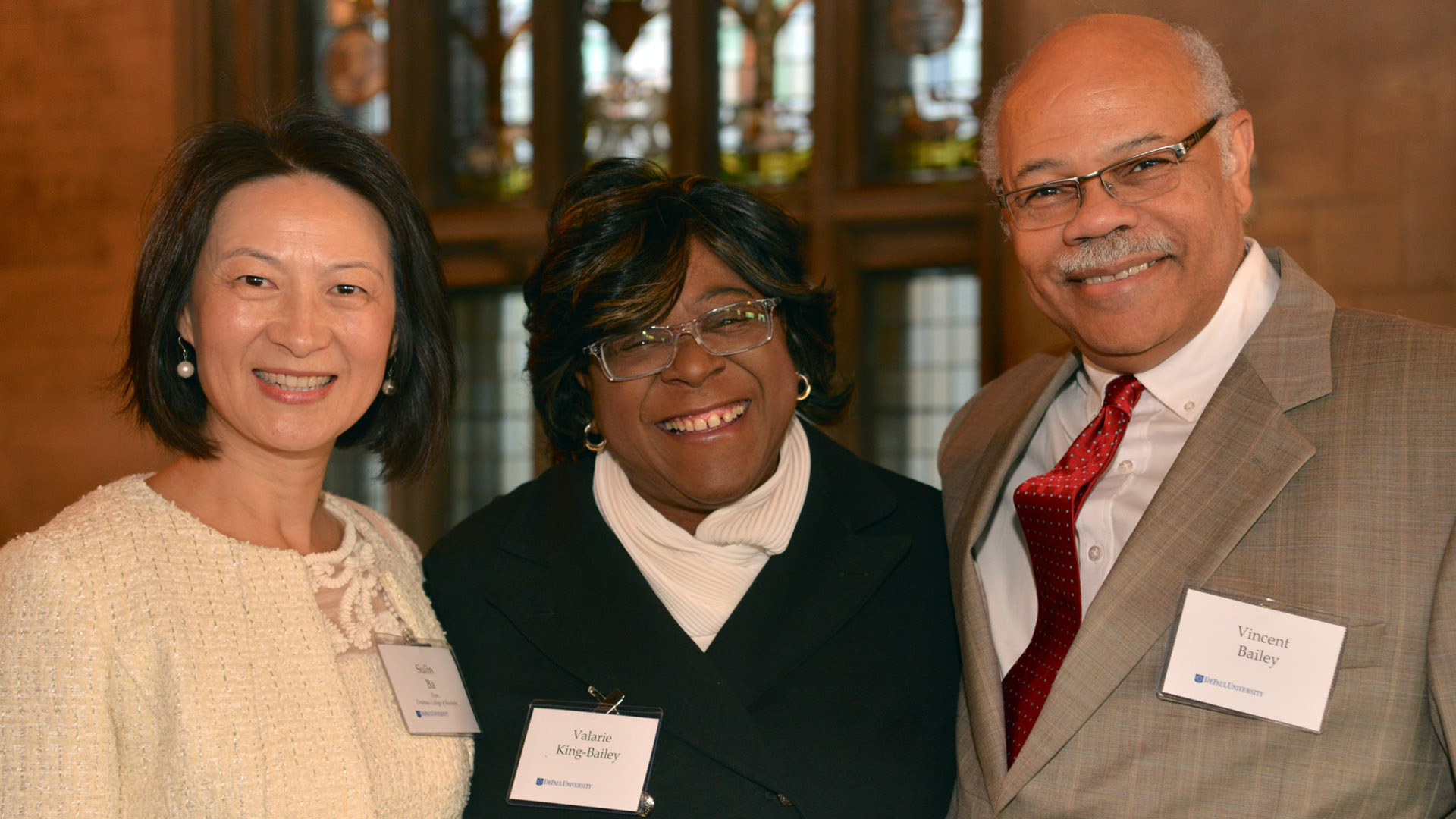 From left to right: Dean of the Driehaus College of Business Sulin Ba with CEC Advisory Board co-chair Valarie King-Bailey and Vincent Bailey.